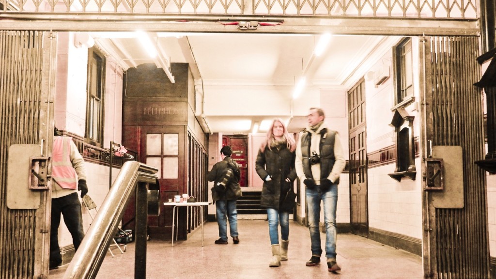 Visitors inside the disused Aldwych station