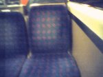 A train seat on the journey home